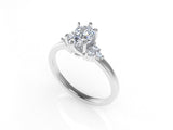 Dione Calypso Ring with an Oval White Diamond and Side Stones Kris Averi