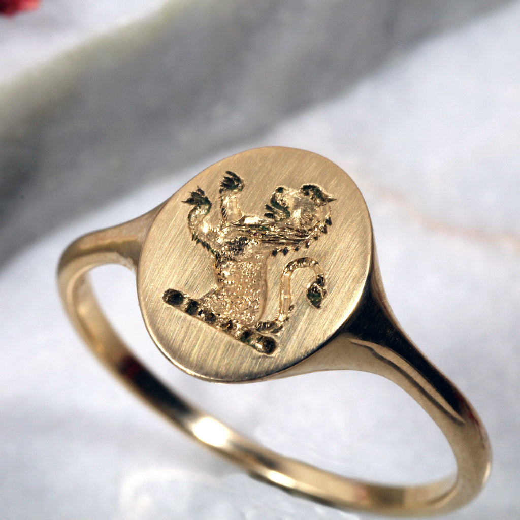 Lion signet ring on sale meaning