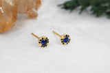 Single Arcus Halo Stud Earring with a Ruby and Black Diamonds Kris Averi 